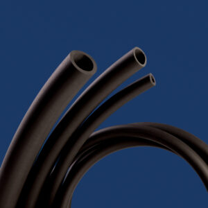 Black Vitube tubing on a dark blue background